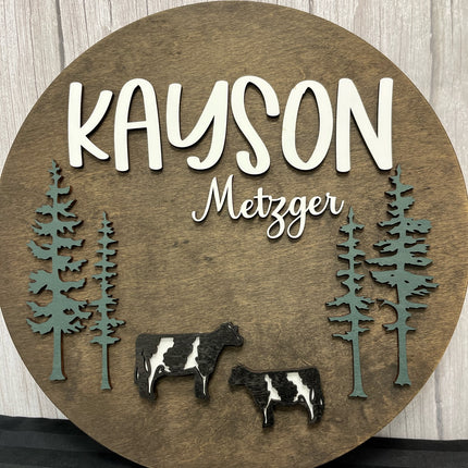NAME ROUND SIGN- "EVERGREENS AND COWS" DESIGN